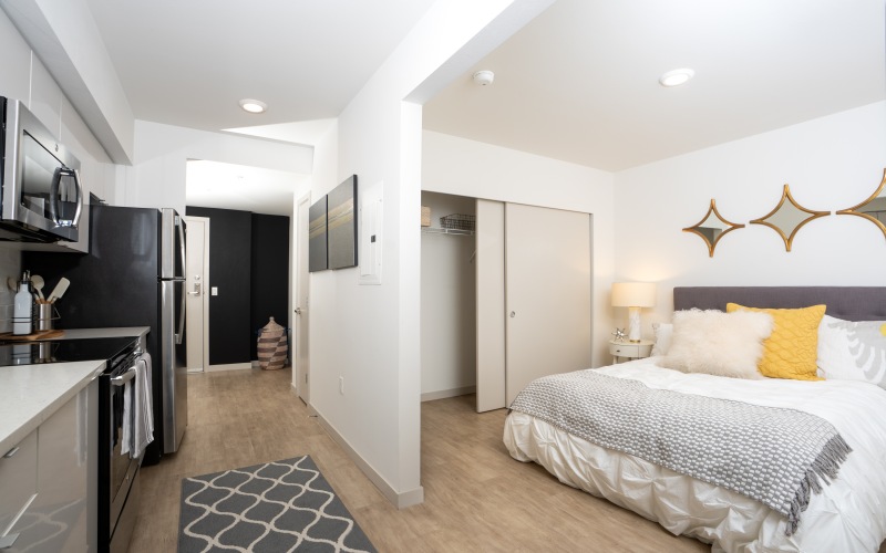 a kitchen and bedroom area