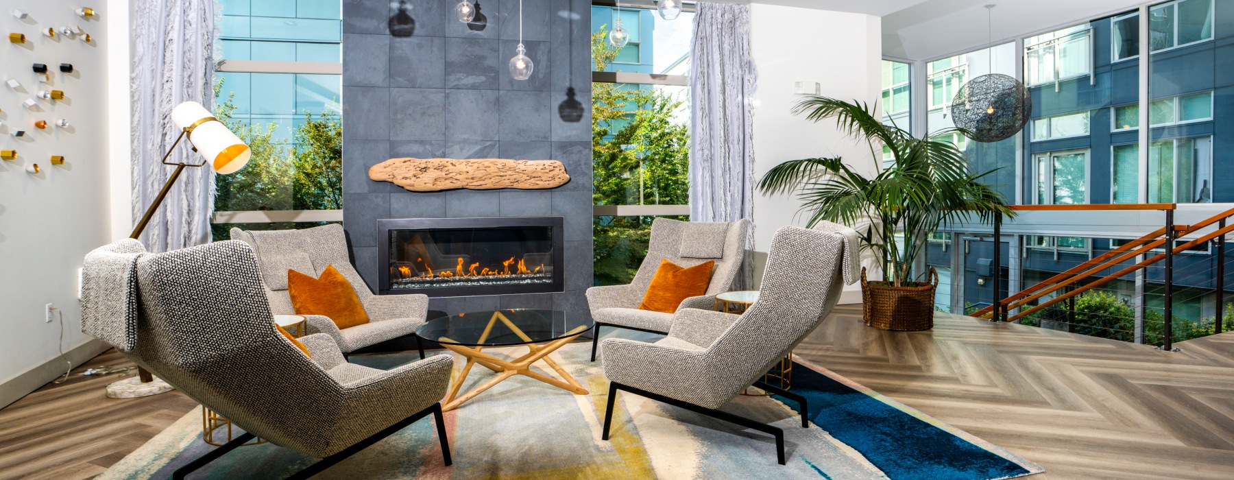 a spacious room with a fireplace