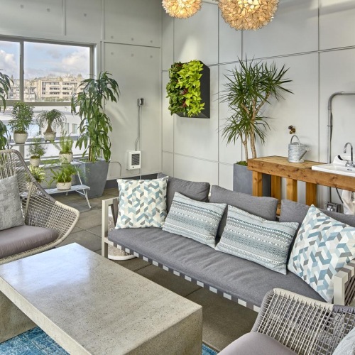 Access to resident-only features a room with a couch and chairs