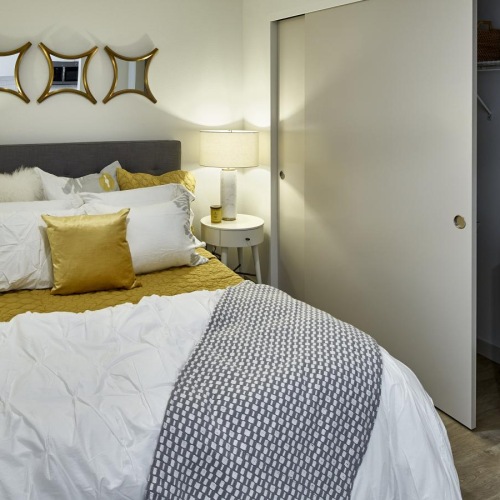 Beautiful bedrooms to fit every need a bed with a blanket on it